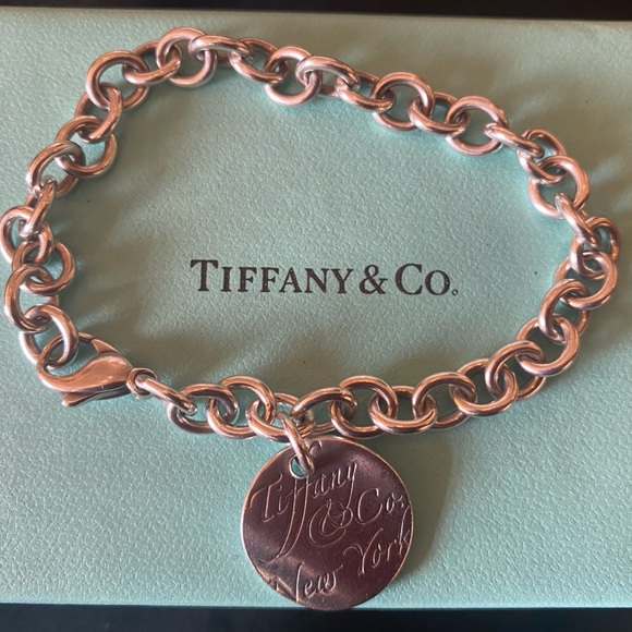 Tiffany Co “notes” round tag bracelet